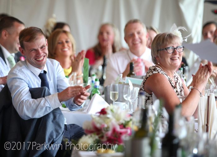 Guests listening to speeches at Hunton Park wedding